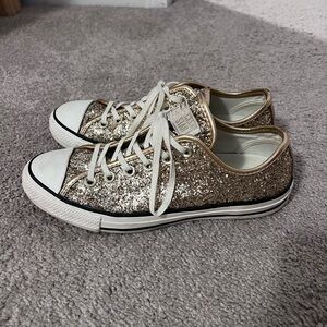 Glittery gold Converse low top sneakers